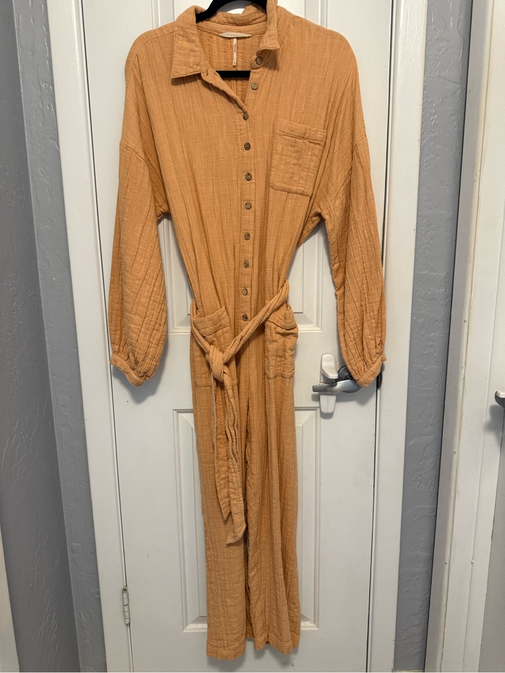 Women’s Free People One-Piece Button-Front Jumpsuit in Peach